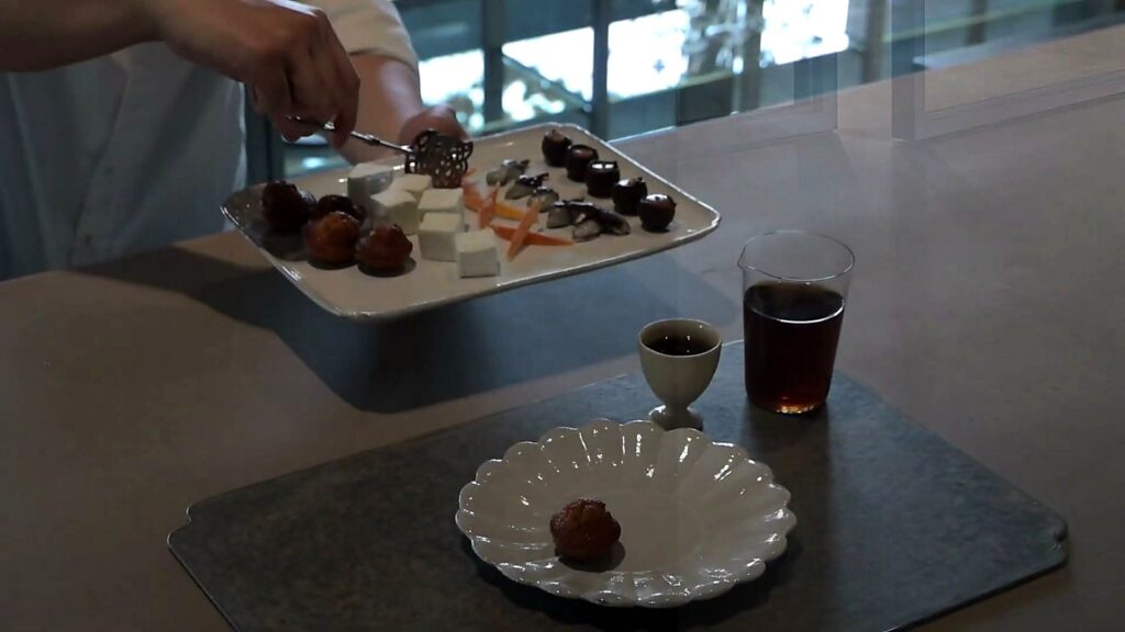 Asako Iwayanagi: Haute Pâtisserie, the Parfait Bijou and the Art of Gelato in Tokyo 22 Petits fours served with iced tea