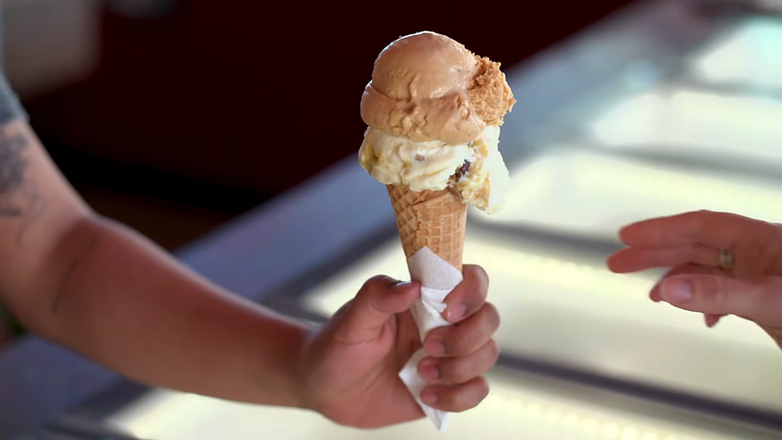 A double scoop heads out across the cabinet.