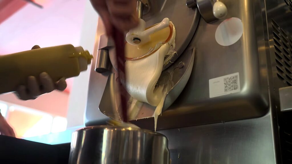 Gelato Messina and Carpigiani: How Nick Palumbo Scaled Gelato, Australian Style 4 Gelato extruding from a batch freezer into a steel tub