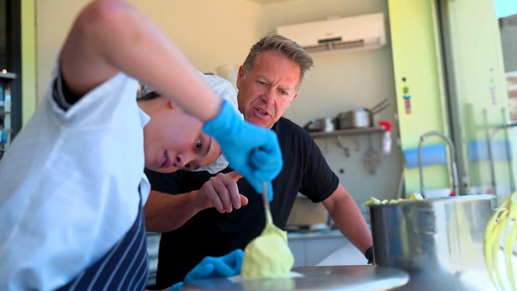 Gelato Messina and Carpigiani: How Nick Palumbo Scaled Gelato, Australian Style 7 Nick Palumbo watching a staff member work pistachio gelato