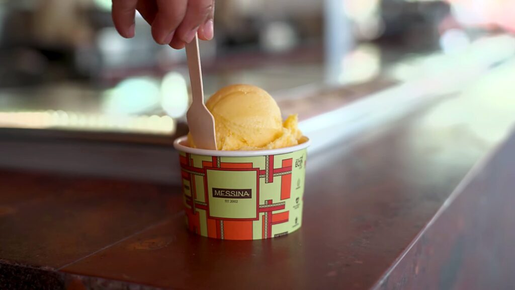 Gelato Messina and Carpigiani: How Nick Palumbo Scaled Gelato, Australian Style 3 Cup of Gelato Messina gelato with a wooden spoon