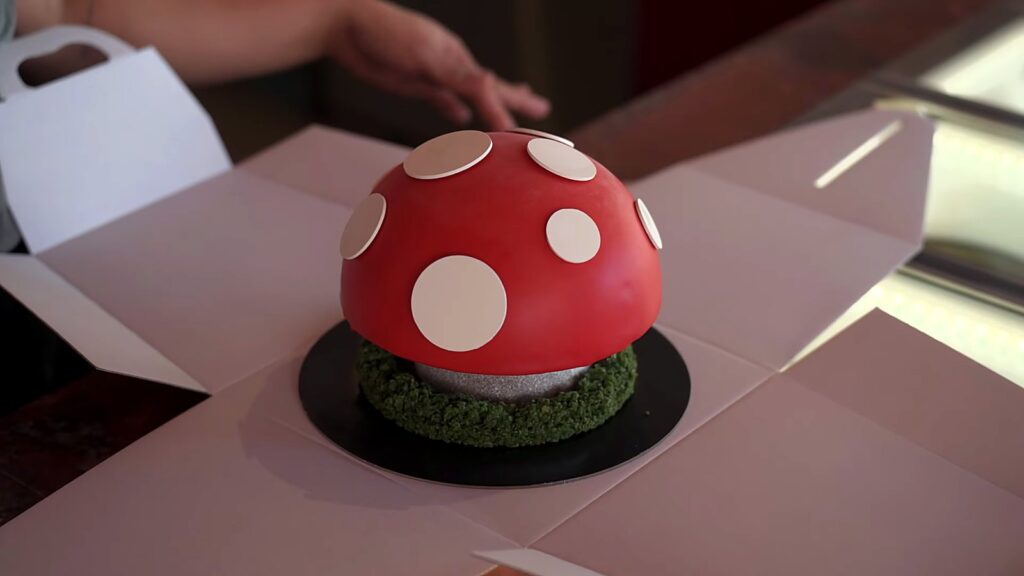 Gelato Messina and Carpigiani: How Nick Palumbo Scaled Gelato, Australian Style 18 Red and white toadstool gelato cake on a mossy base