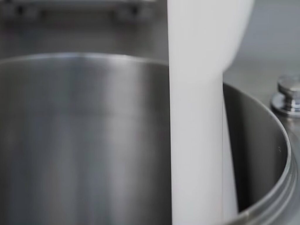 Carpigiani Lab-O-Chef 5: Pastry, Chocolate, Savoury and Gelato from One Countertop Machine 17 Beater being lifted out of the cylinder