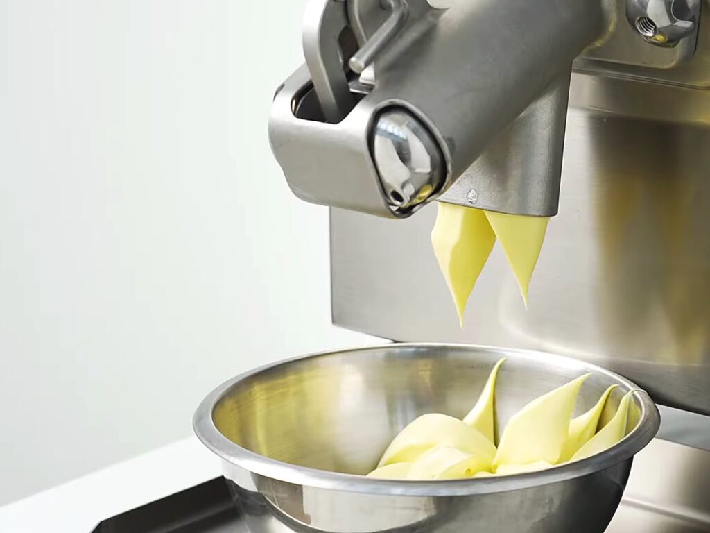 Carpigiani Lab-O-Chef 5: Pastry, Chocolate, Savoury and Gelato from One Countertop Machine 2 Pastry cream ribbons folding into a steel bowl