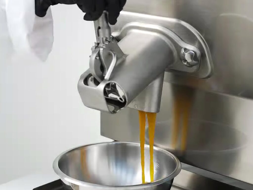 Carpigiani Lab-O-Chef 5: Pastry, Chocolate, Savoury and Gelato from One Countertop Machine 4 Caramel pouring from the four-position tap