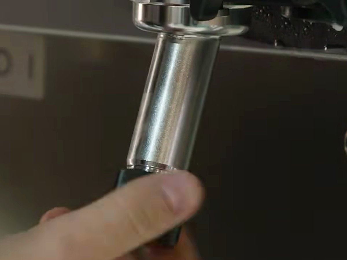 Fitting the kit at the dispensing head.