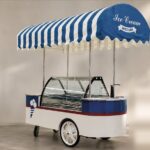 Ice cream cart with display cabinet powered by a battery system